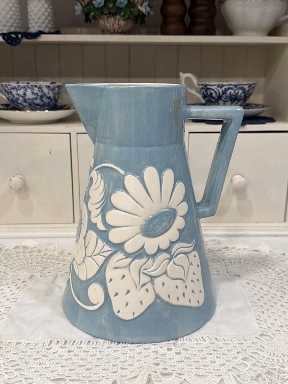 Blue Ceramic Floral Relief Pitcher with Daisy Motif